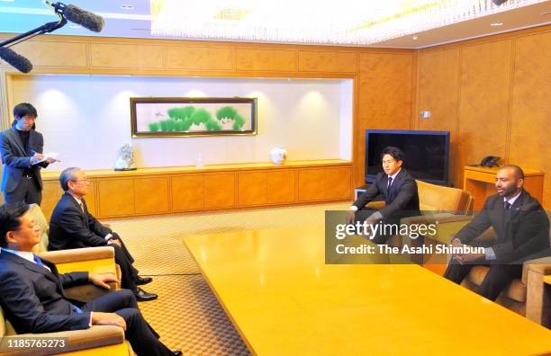 Michael Leitch and Yoshitaka Tokunaga talk with Toshiba CEO Nobuaki Kurumatani during their visit the Toshiba headquarters on November 5, 2019 in...