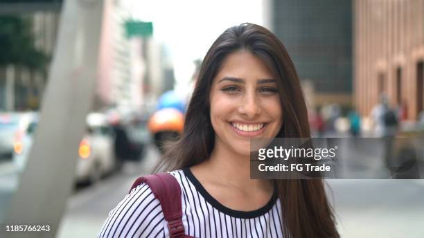 portrait of a teenager girl in an avenue - avenida paulista imagens e fotografias de stock