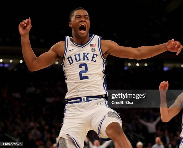 Cassius Stanley of the Duke Blue Devils celebrates his dunk in the second half against the Kansas Jayhawks during the State Farm Champions Classic at...