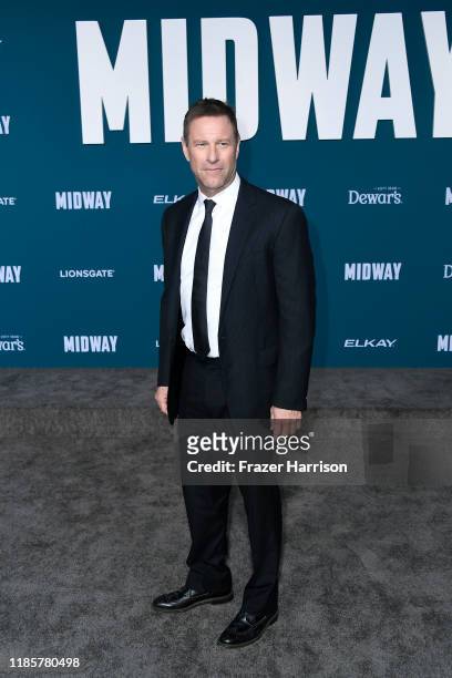 Aaron Eckhart attends the premiere of Lionsgate's "Midway" at Regency Village Theatre on November 05, 2019 in Westwood, California.