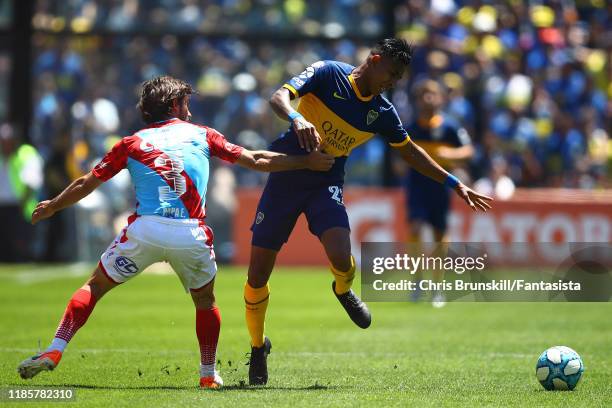 Sebastian Villa of Boca Juniors in action with Emiliano Papa of Arsenal during a match between Boca Juniors and Arsenal as part of Superliga...