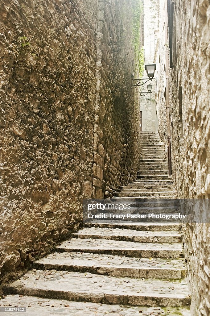 Medieval stone walls and ascending steps