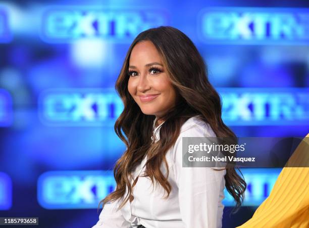 Adrienne Bailon visits "Extra" at Burbank Studios on November 05, 2019 in Burbank, California.