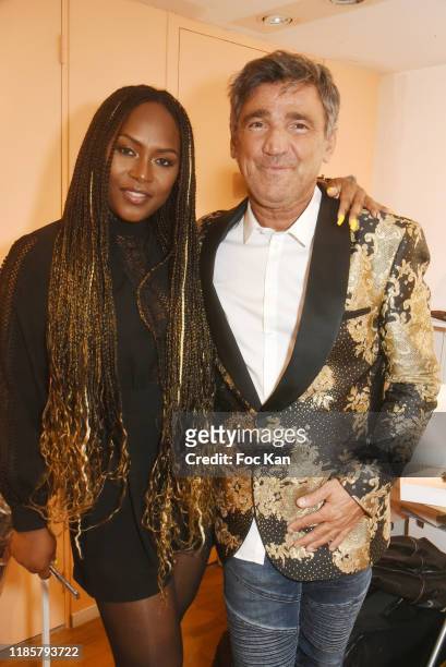 Singer DannyLC aka Danielle Crusoé and Luigi di Donna from Red Collector magazine attend the "Overview" exhibition preview by David Feruch at Galerie...