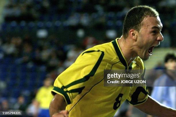 Schumacher of the Brazilian Indoor Soccer Selection, celebrated a goal against Argentina, in Guatemala City, 27 November 2000. AFP PHOTO Jorge UZON...