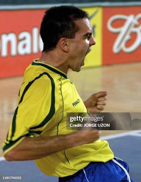 Fininho, of the Brazilian Indoor Soccer Selection celebrates a goal against Egypt, in Guatemala City, 26 November 2000. AFP PHOTO / Jorge UZON...