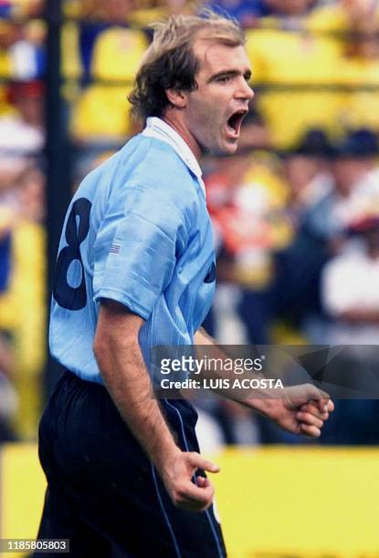 Andres Martinez celebrates the second goal for the Uruguayan team, 29 July 2001 on the Nemesio Camacho Stadium in Bogota, Colombia, during a...