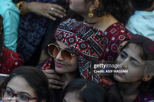 People celebrate the annual Sindhi Cultural Day to highlight the ancient culture of Sindh rooted in the Indus Valley Civilization of Bronze Age, in...