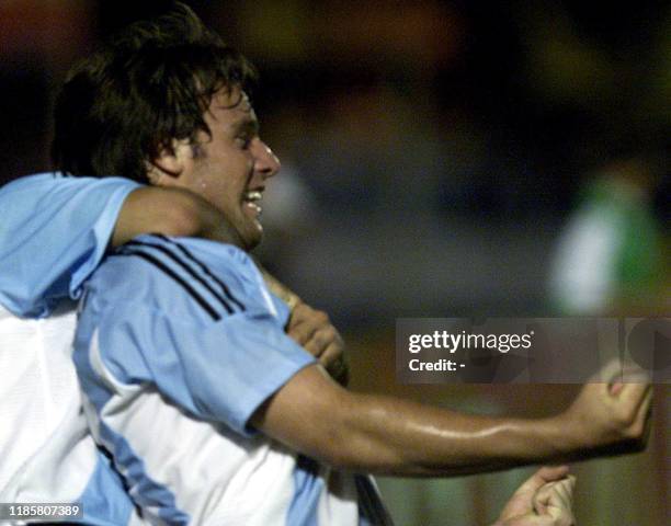 Fernando Cavenahi of the Argentinian soccer team celebrates after scoring a goal against Colombia, 06 January 2003, at the Campus de Colonia Stadium,...