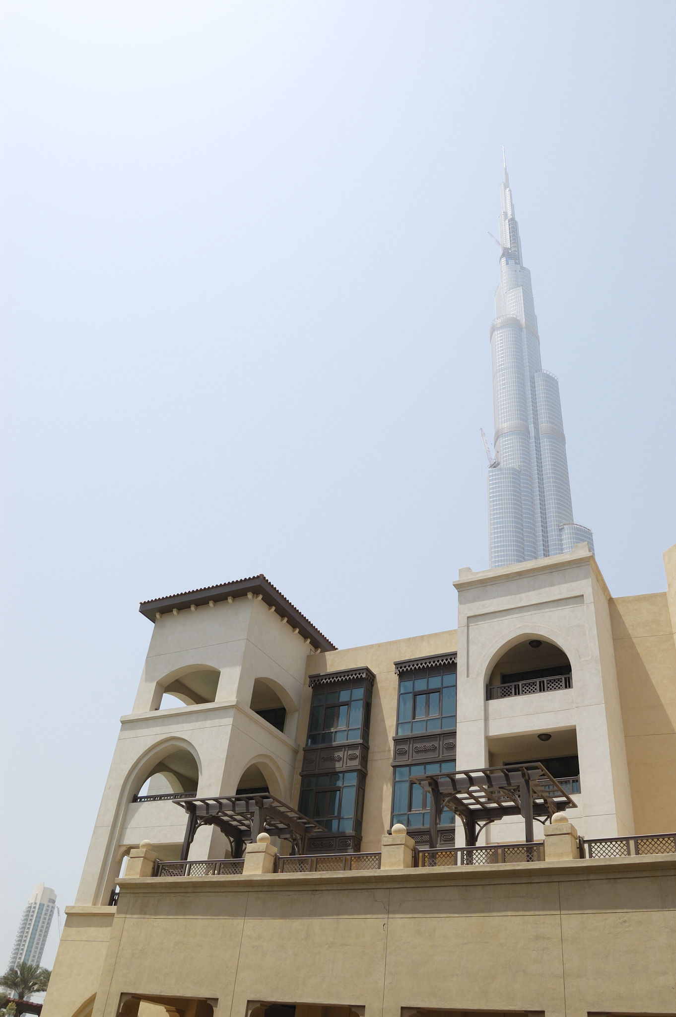 Burj Dubai skyscraper and traditional arabic style hotel, UAE Burj Dubai skyscraper and traditional arabic style hotel, UAE