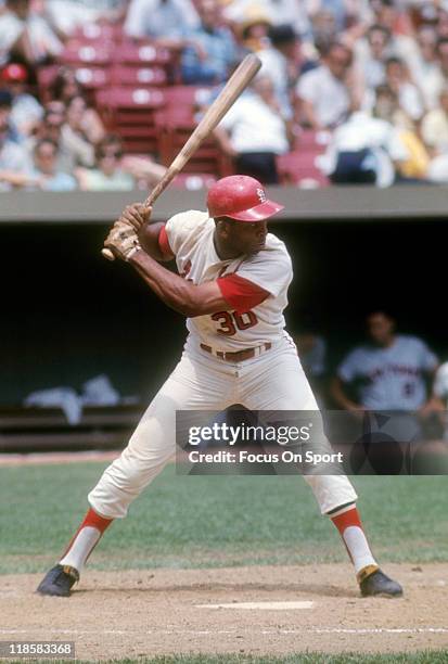 Orlando Cepeda of the St. Louis Cardinals bats against New York Mets during a Major League Baseball game circa 1967 at Busch Stadium in St. Louis,...