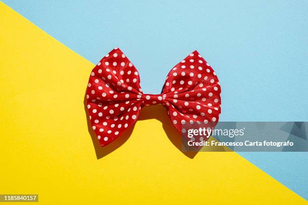 red polka dot bow tie - plaid bow tie stock pictures, royalty-free photos & images