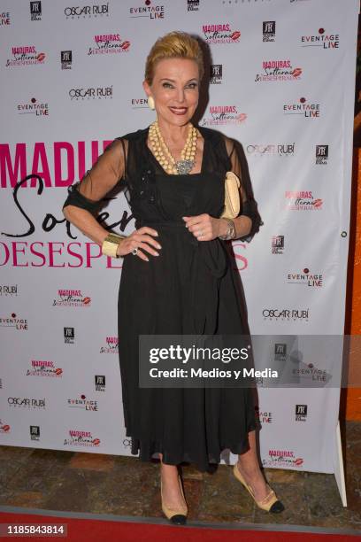 Raquel Bessudo poses for photos before 100th shows celebration of 'Maduras, Solteras y Desesperadas' red carpet at San Rafael Theatre on November 5,...