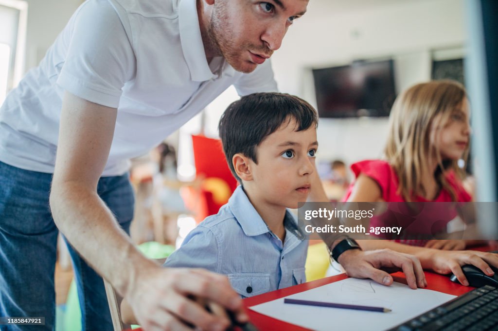 Scotty Using Computer Children School For Computers High-Res Stock Photo - Getty Images