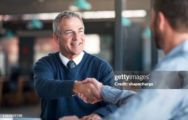 i'm glad we could finally meet - businessman talking stock pictures, royalty-free photos & images