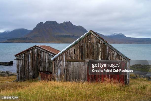 abandoned farmhouse at gjögur village, westfjords, iceland - westfjords iceland stock pictures, royalty-free photos & images