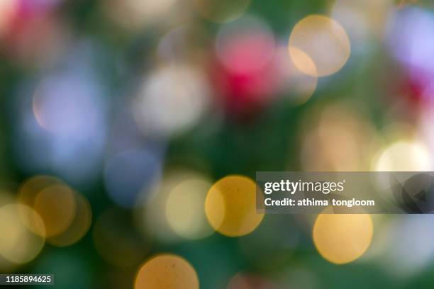 defocused bokeh lights - green christmas designs stock pictures, royalty-free photos & images