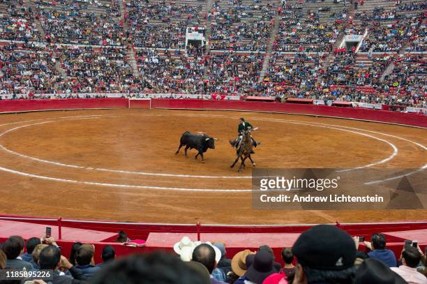 Mexicans watch a Sunday afternoon bullfight on November 3, 2019 at the Plaza del Toros in Mexico City, Mexico.