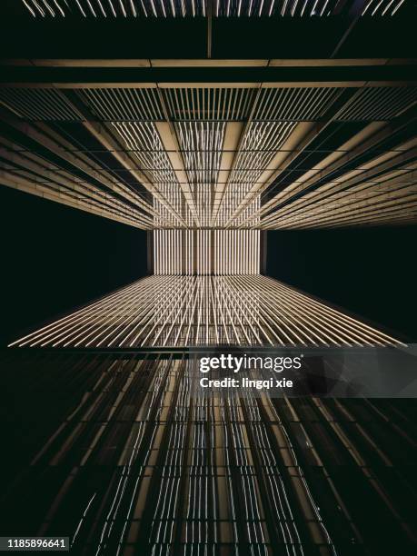 the facade of modern architecture at night - brick path stock pictures, royalty-free photos & images