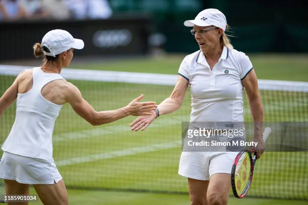 Martina Navratilova of United States of America and Cara Black of Zimbabwe in action during the Ladies Invitational Doubles against Mary Joe...