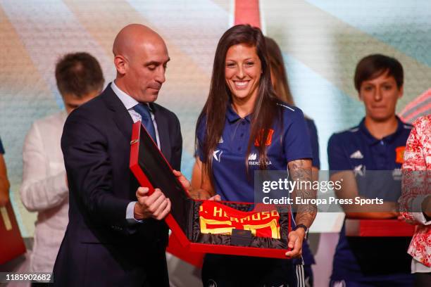 Luis Rubiales, President of the Spanish Federation of Football RFEF, gives an Official T-Shirt of Spain Team and a Gold Medal to Jenni Hermoso during...