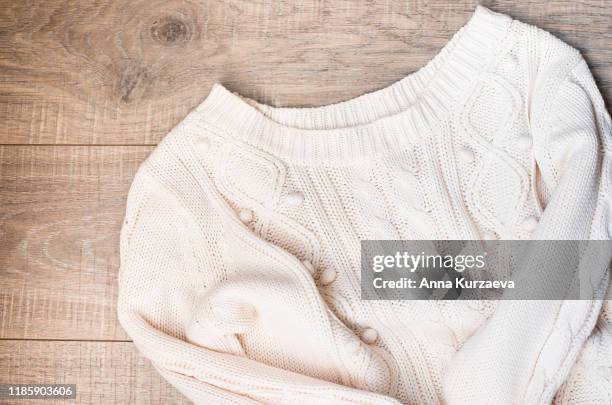 women's autumn, winter clothes - white knitted pullover oversize, top view. flat lay. - hot big women stock pictures, royalty-free photos & images