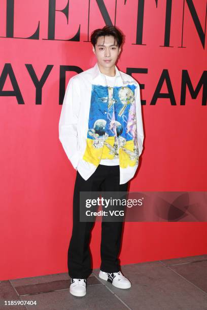 Singer Lay Zhang Yixing attends Valentino flagship store opening ceremony at Sanlitun on November 6, 2019 in Beijing, China.