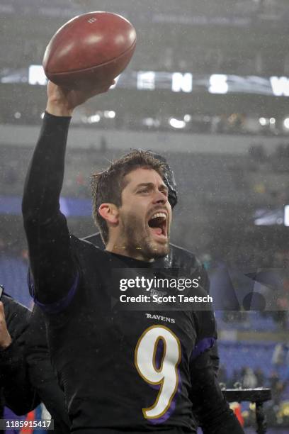 Justin Tucker of the Baltimore Ravens celebrates after kicking the game winning field goal against the San Francisco 49ers after the game at M&T Bank...