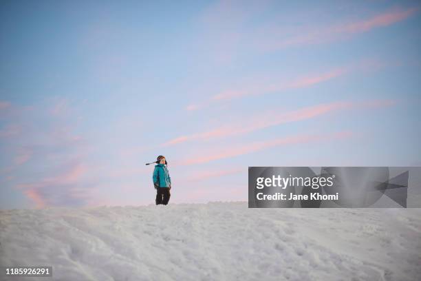 little boy having fun on a snowy hill - recreational equipment stock pictures, royalty-free photos & images
