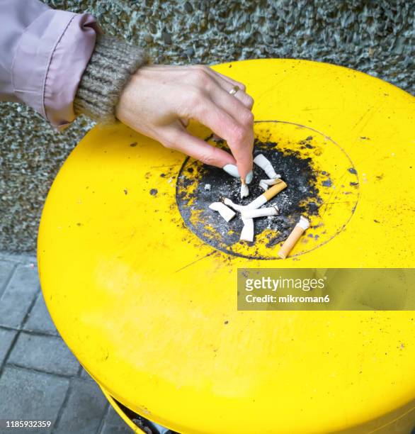 Put Out Cigarette Photos and Premium High Res Pictures - Getty Images