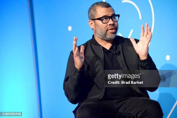 Jordan Peele speaks on stage at the "Unconventional Storytelling: A Creative Conversation with Donna Langley and Jordan Peele" panel at the Fast...