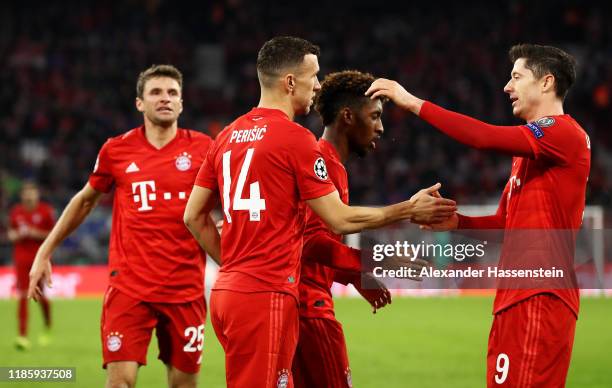 Ivan Perisic of FC Bayern Munich celebrates with teammates Robert Lewandowski and Serge Gnabry after scoring his team's second goal during the UEFA...