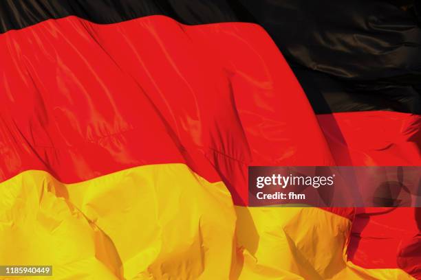 german flag (berlin, germany) - german flag wallpaper stock-fotos und bilder