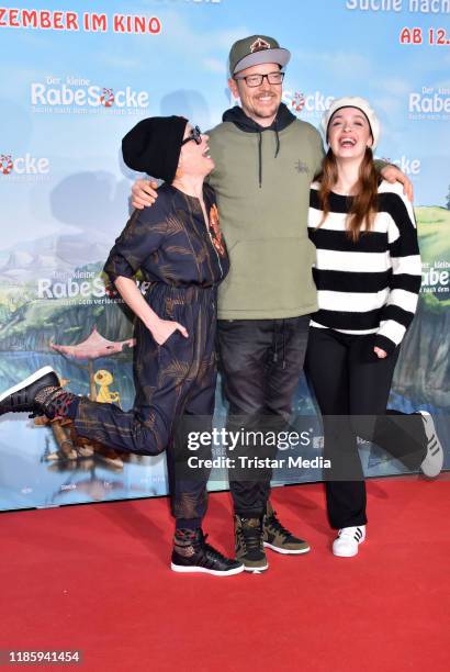 Jan Delay, Anna Thalbach and Nellie Thalbach attend the premiere of "Der kleine Rabe Socke - Suche nach dem verlorenen Schatz" at Kino in der...