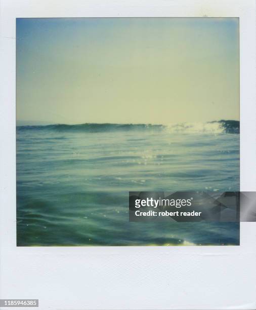polaroid photograph of the sea and wave - seascape stock pictures, royalty-free photos & images