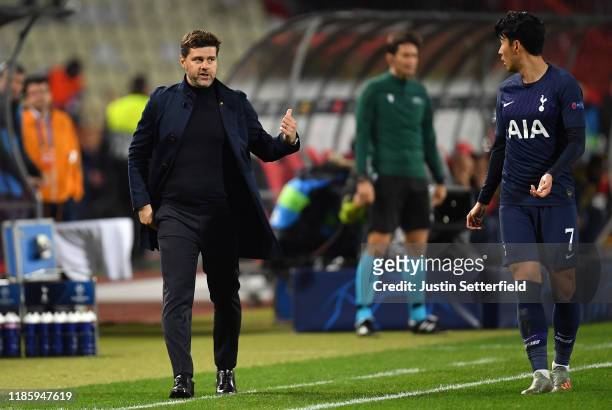 Mauricio Pochettino, Manager of Tottenham Hotspur talks to Heung-Min Son of Tottenham Hotspur during the UEFA Champions League group B match between...