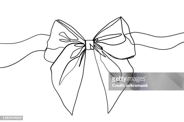 single line drawing of a ribbon - christmas bow stock-fotos und bilder