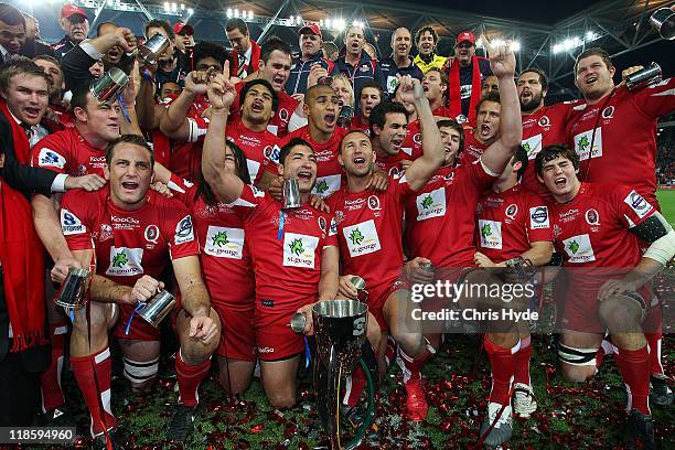 Reds celebrate winning the 2011 Super Rugby Grand Final match between the Reds and the Crusaders at Suncorp Stadium on July 9, 2011 in Brisbane,...