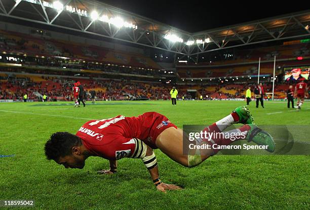Digby Ioane of the Reds break-dances for the crowd after winning the 2011 Super Rugby Grand Final match between the Reds and the Crusaders at Suncorp...