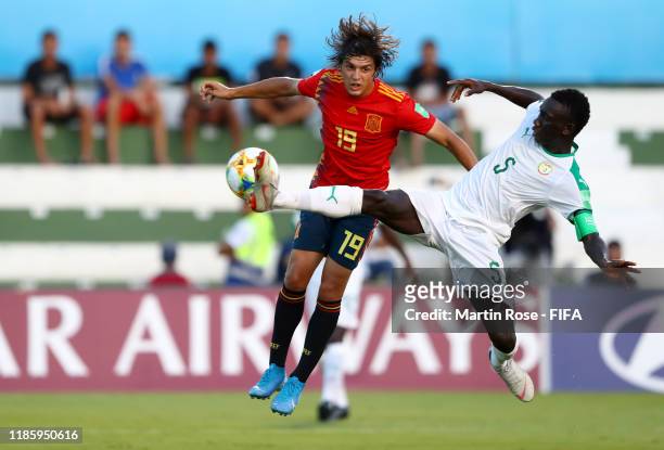 Pablo Moreno of Spain in action against Cheikhou Ndiaye of Senegal during the FIFA U-17 World Cup Brazil 2019 round of 16 match between Spain and...