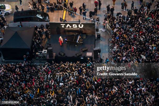 Pablo Alboran and Ava Max perform on stage during 'Tabu' videoclip presentation at Callao square on November 06, 2019 in Madrid, Spain.