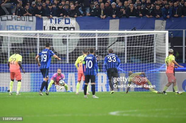 Kyle Walker of Manchester City makes a save while he is in goal for Claudio Bravo of Manchester City who was shown the red card during the UEFA...