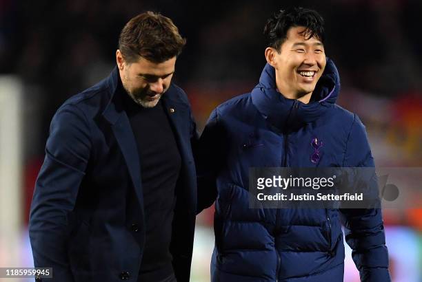 Mauricio Pochettino, Manager of Tottenham Hotspur speaks with Heung-Min Son of Tottenham Hotspur after the UEFA Champions League group B match...
