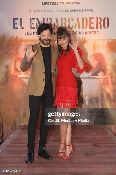 Alvaro Morte and Irene Arcos pose for photos after the press conference of 'El Embarcadero' at Hotel St. Regis on November 6, 2019 in Mexico City,...