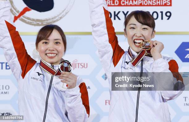 Hikaru Mori of Japan poses for a photo after winning the women's individual event at the trampoline gymnastics world championships in Tokyo on Dec. 1...