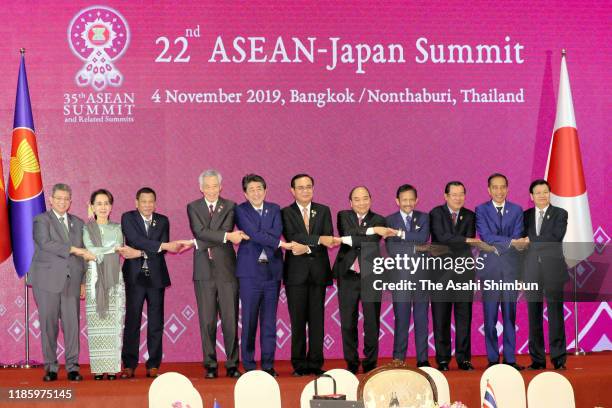 Leaders pose at the family photo session during the ASEAN-Japan summit on the sidelines of the ASEAN Summit on November 4, 2019 in Bangkok, Thailand.