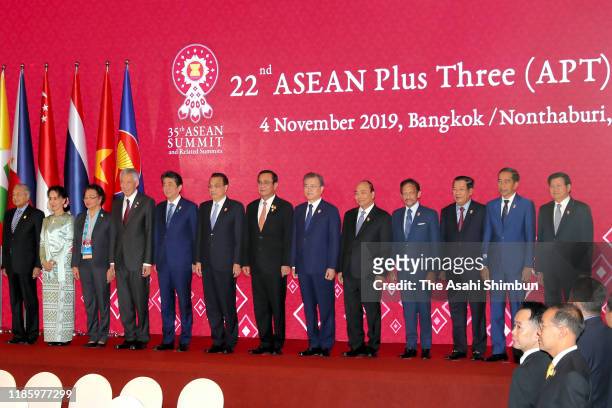 Leaders pose at the family photo session of the ASEAN Plus Three meeting on the sidelines of the ASEAN Summit on November 4, 2019 in Bangkok,...