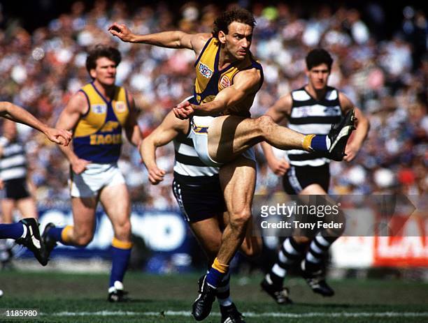 Peter Matera of West Coast in action in the AFL Grand Final match between the West Coast Eagles and the Geelong Cats, played at the Melbourne Cricket...