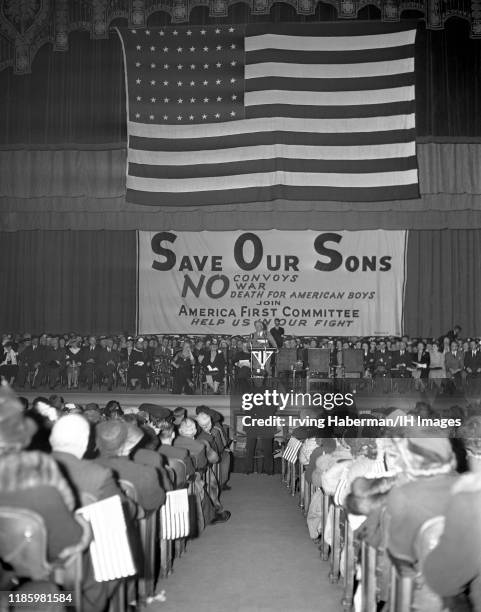 General view of a large crowd attending the America First Committee rally circa 1941 in New York, New York. The AFC was the pressure group against...