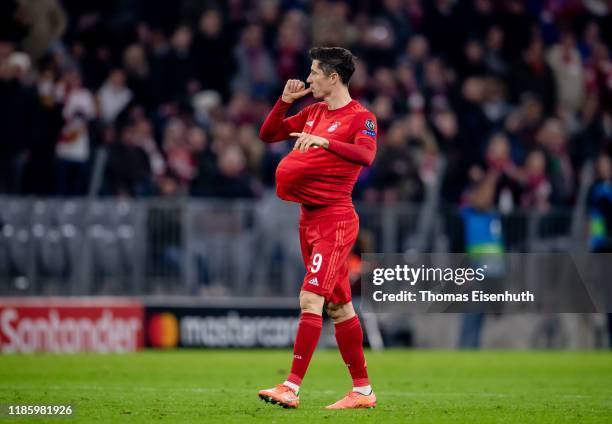 Robert Lewandowski of Munich celebrates after scoring the opening goal during the UEFA Champions League group B match between Bayern Muenchen and...